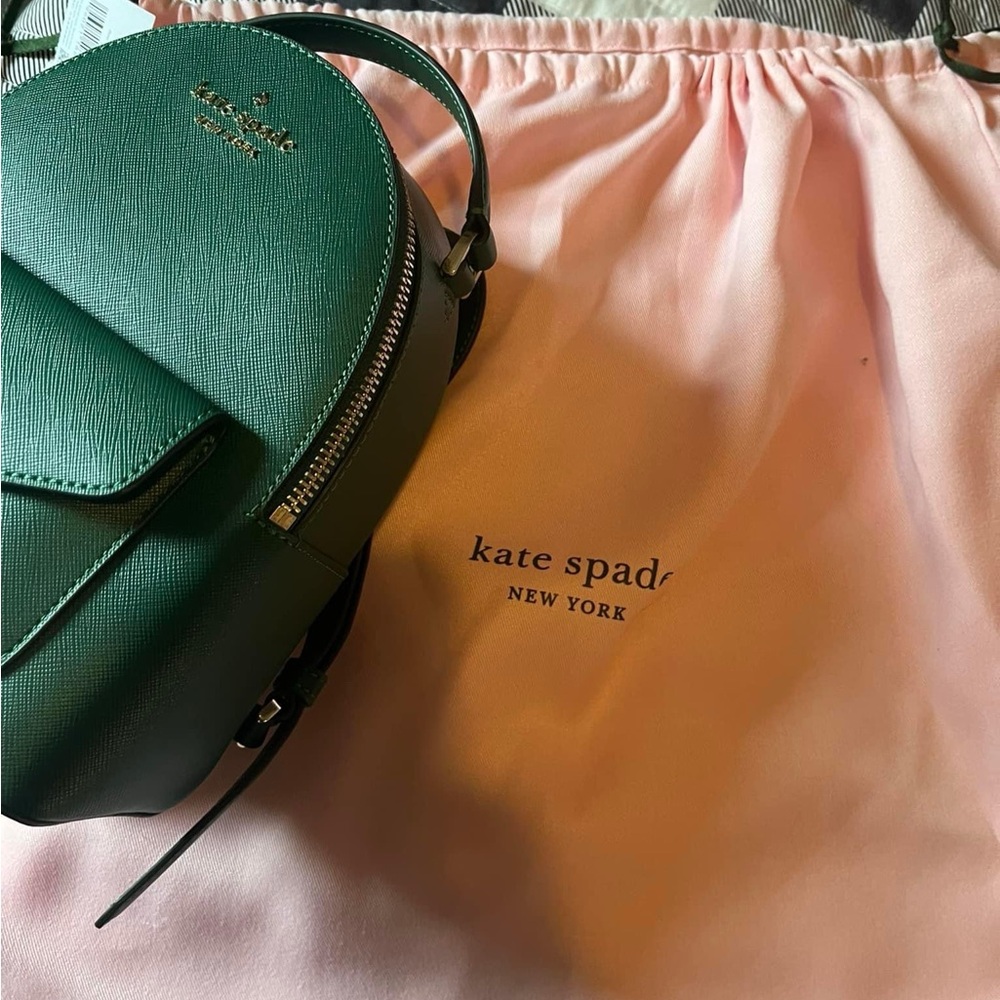 Mini forest green Kate Spade mini backpack. Brand new. Tags still attached.